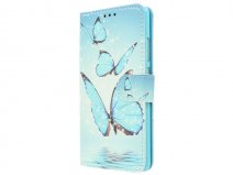 Blue Butterflies Bookcase - Huawei P9 Hoesje